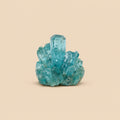 Mineral crystal on a beige background
